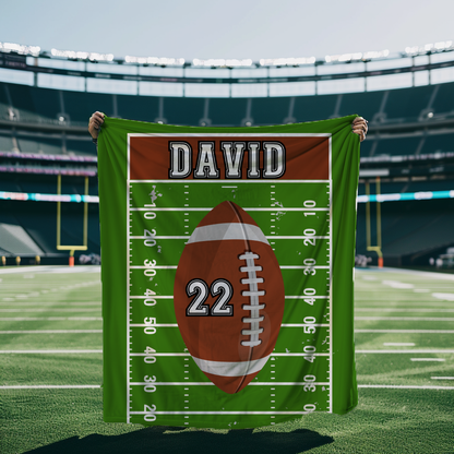 customizable fleece sherpa blanket with a football design with player name and jersey number 