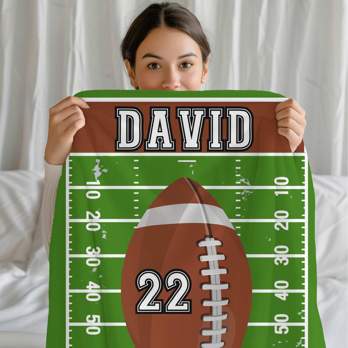 Fleece Blanket with a football design customizable with player name and jersey number 