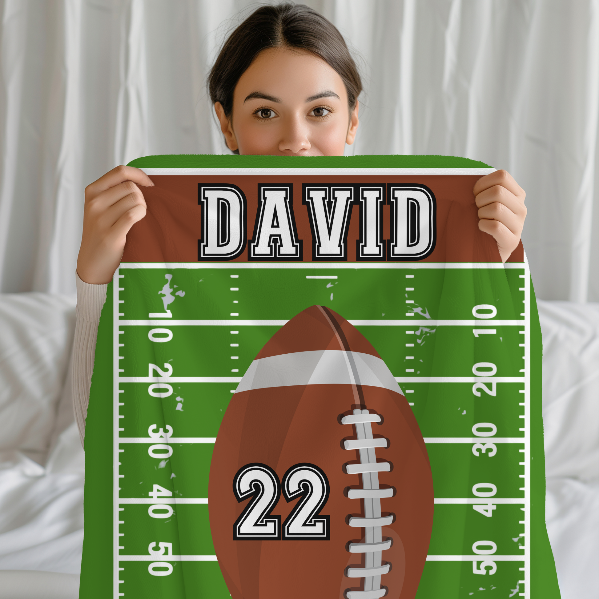 Fleece Blanket with a football design customizable with player name and jersey number 